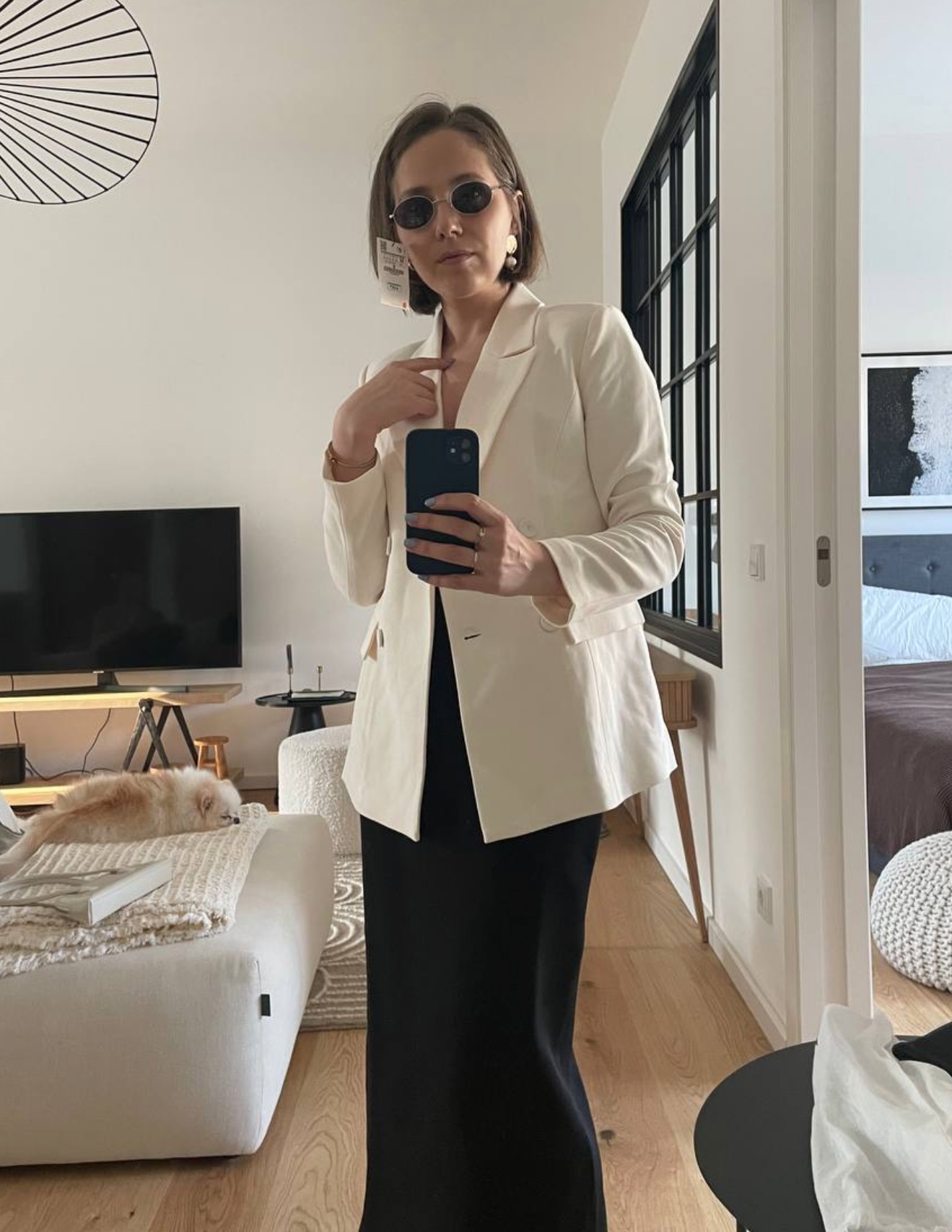 After styling: white blazer outfit with black trousers